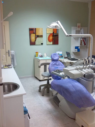 Clinica Dental Arcodental logo