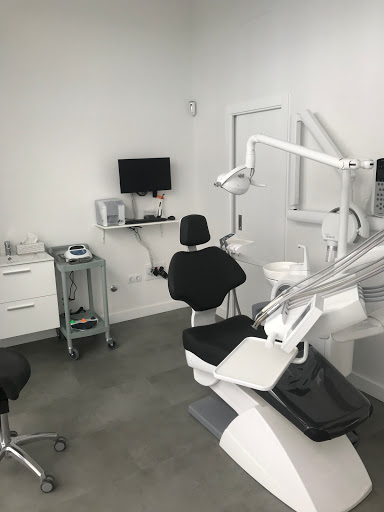 Clinica Dental Mueca logo