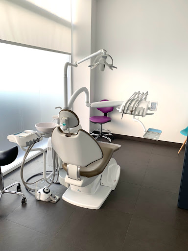 Clinica Dental Maxilofacialclinic logo